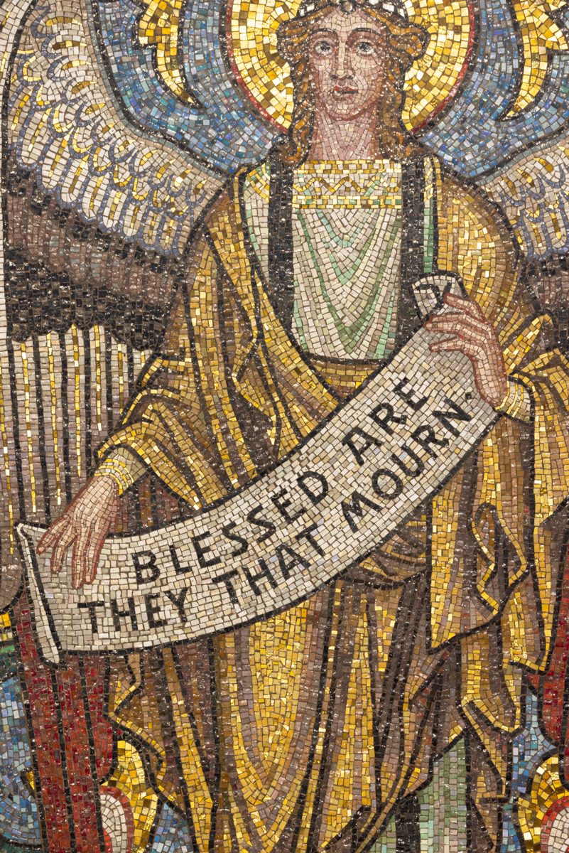 Mosaic angel reading ‘Blessed are they that mourn’